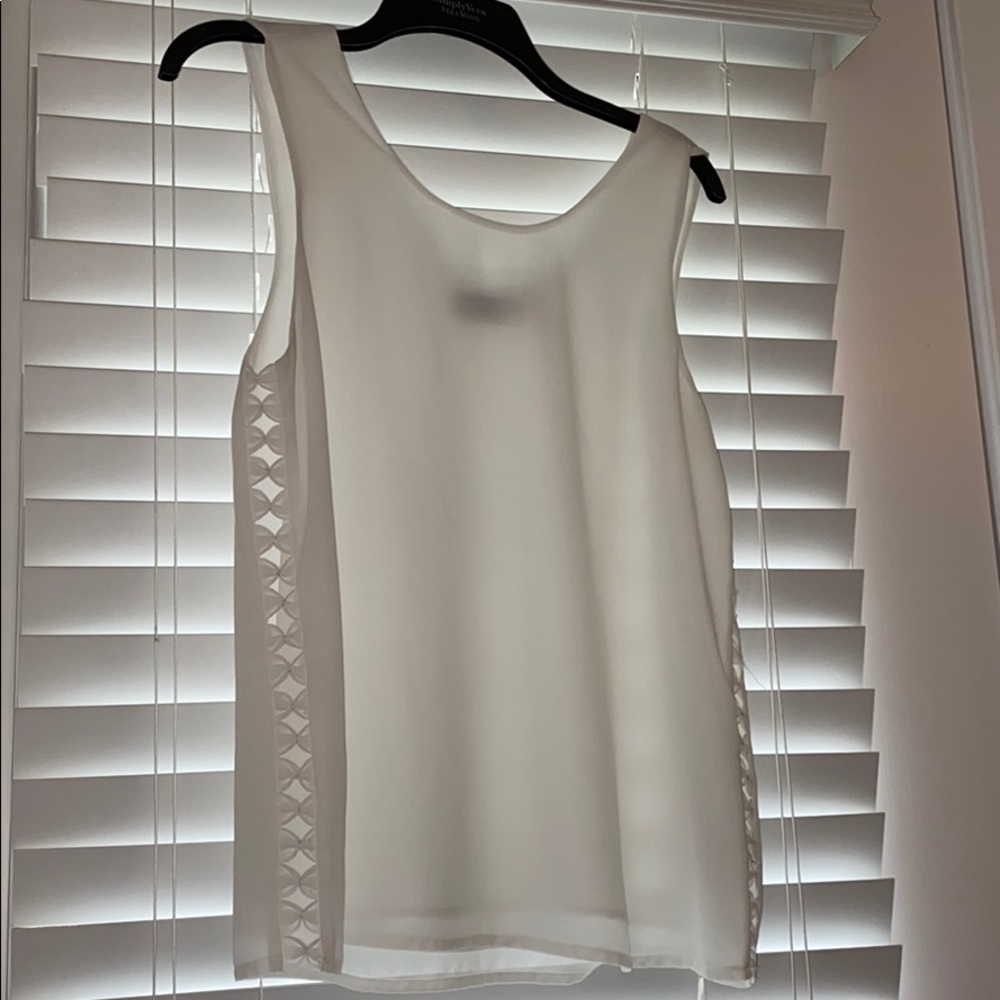 White blouse with bow detail